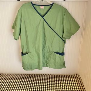 New condition green and navy scrub uniform top with adjustable back and pockets!